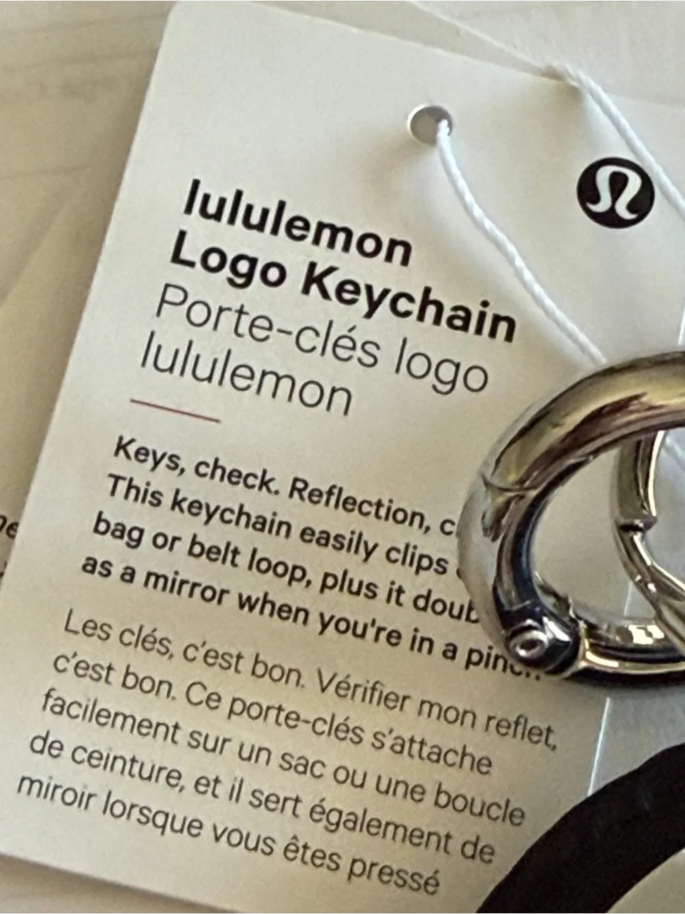 Lululemon Round Logo Keychain in Black and Silver